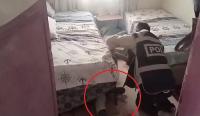Polis, aranan şahsı saklandığı yatağından altında buldu
